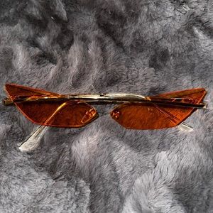 unisex, fun, orange, sunglasses cool shape  brand new, never used